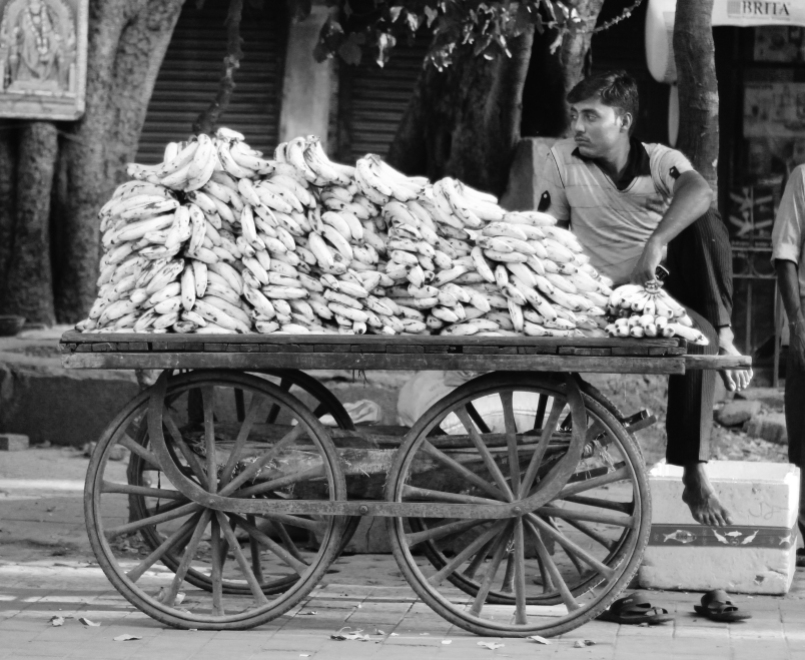 man selling bananas in Delhi