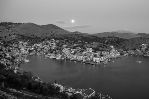 Moonset over Symi in black and white